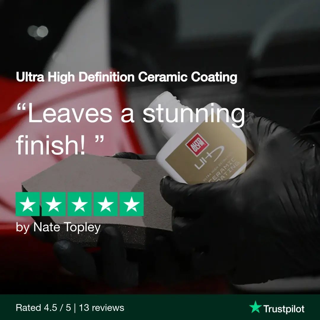 Person holding a car detailing product with text about ceramic coating and Trustpilot rating.