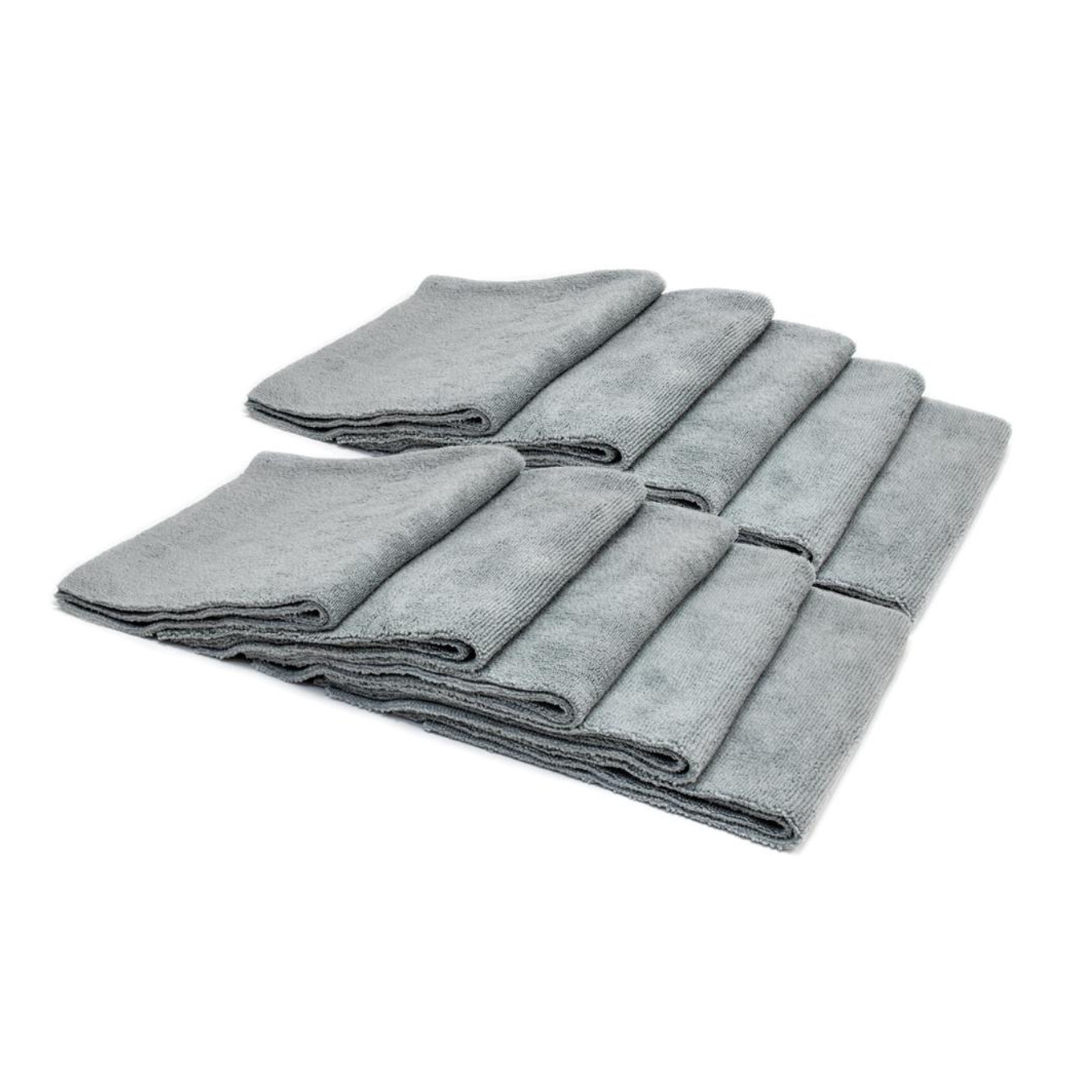 Folded gray EWOCAR towel on a white background