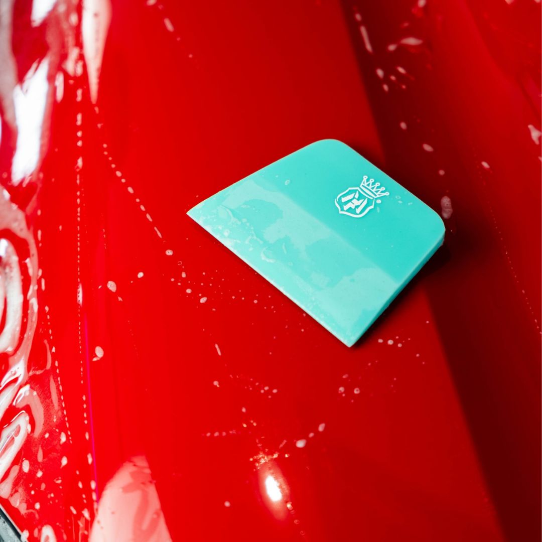 Labocosmetica SLIPUM - PPF Squeegee 65x75 mm on red car
