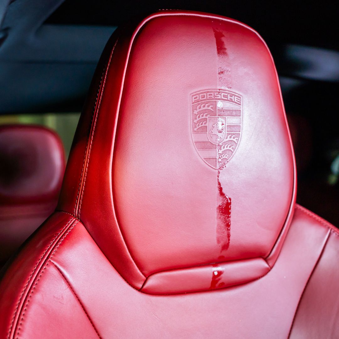 Red Porsche car leather seat with logo