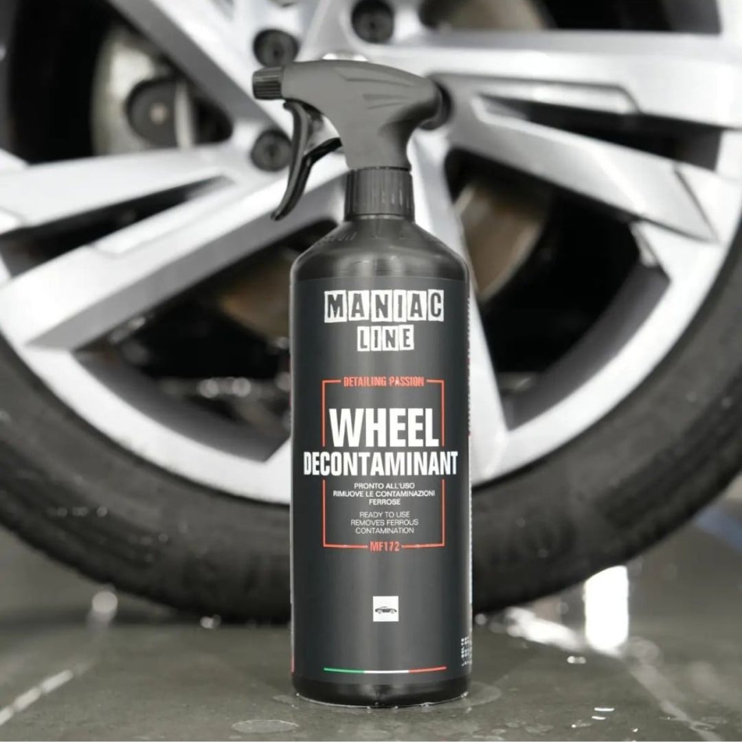 Maniac Wheel Decontaminant 1L (High-Cling Wheel Cleaner) in front of VW wheel