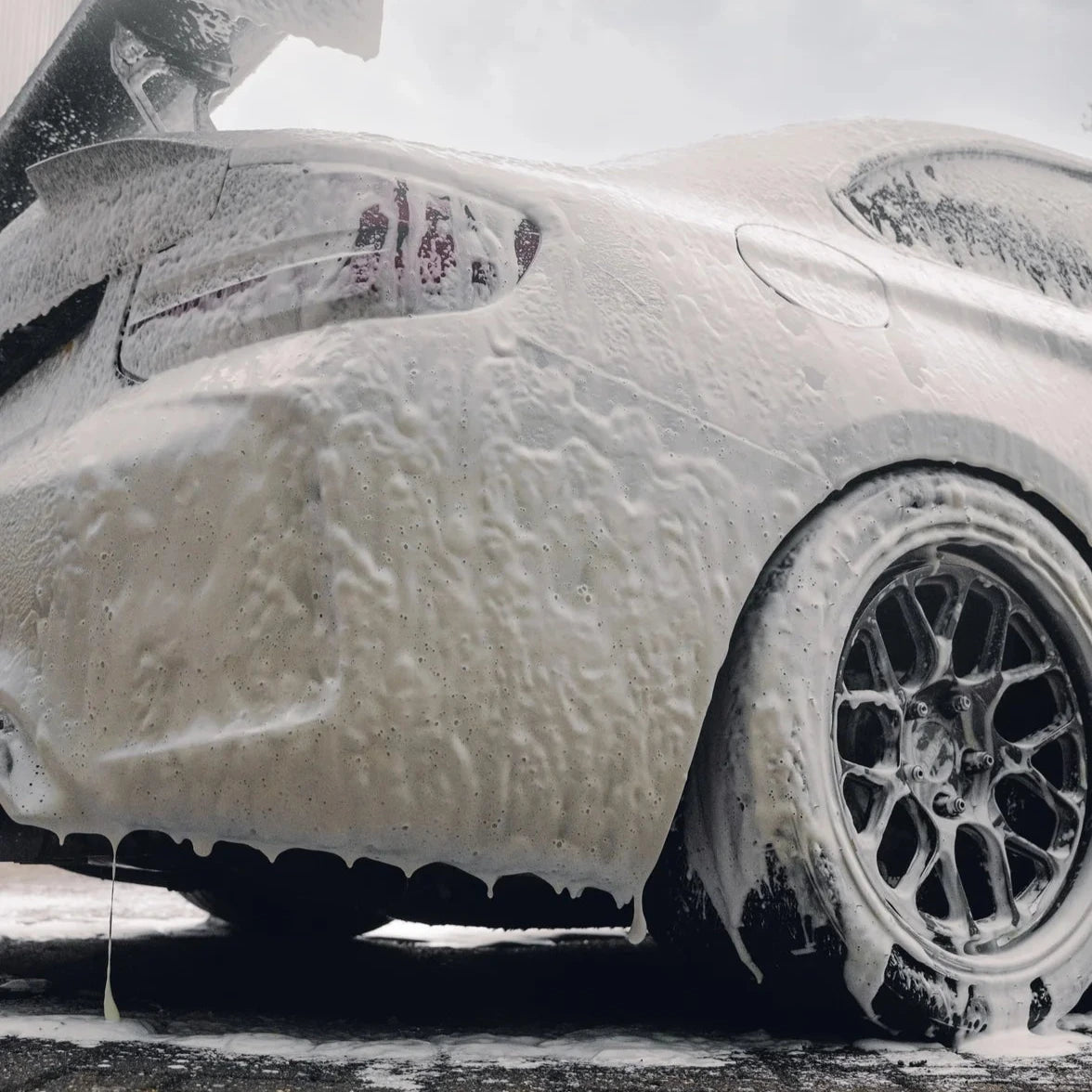 Car washing with snow foam stjarnagloss sno x suds on a cloudy day