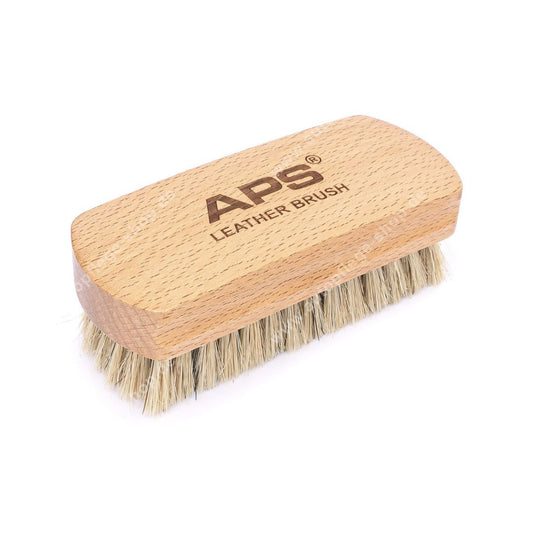 A wooden leather and Alcantara brush with natural wood handle and light tan bristles, featuring the brand name 'APS' and 'LEATHER BRUSH' engraved on the top, shown on a white background.