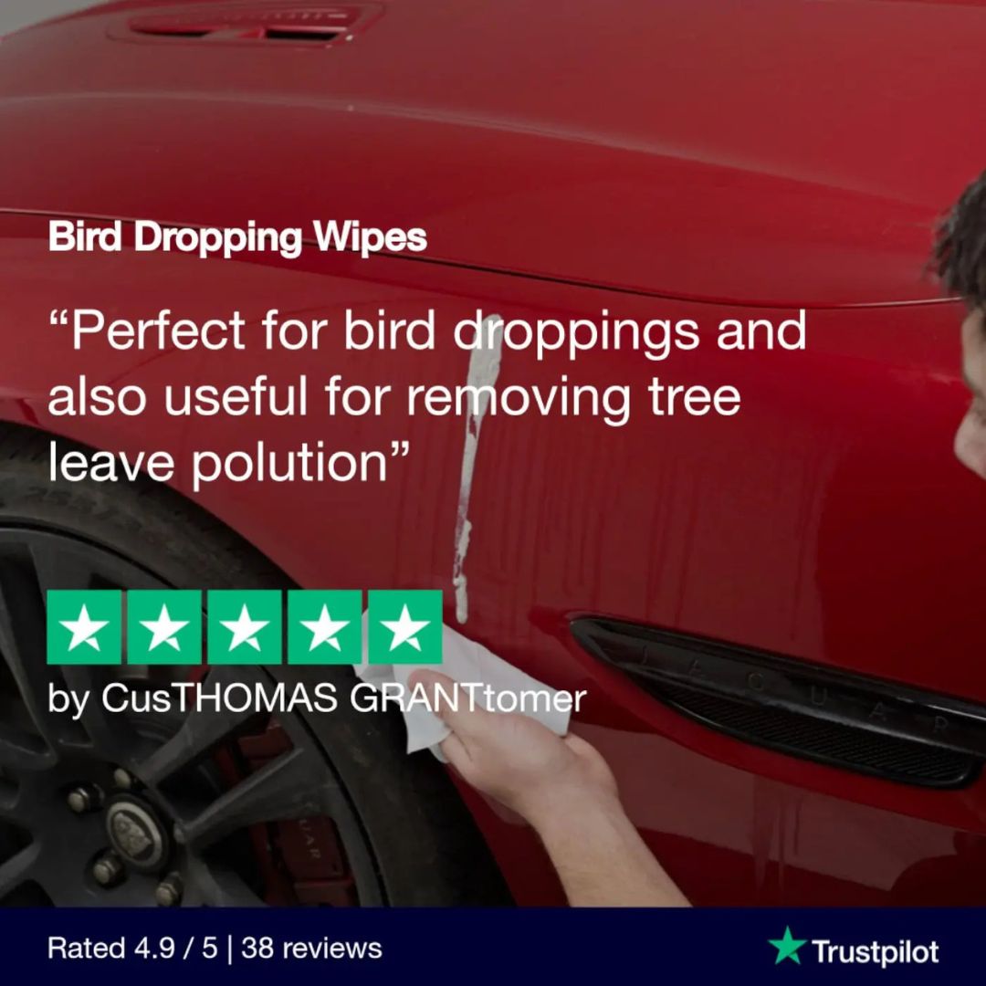 Person cleaning a red car with bird dropping wipes, featuring Trustpilot rating.
