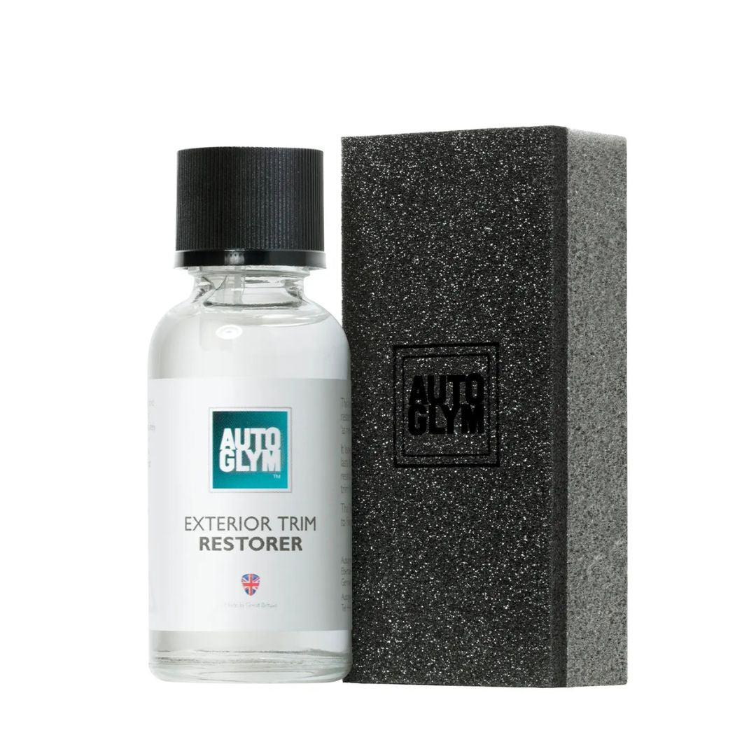 Auto Glym exterior trim restorer bottle with black applicator pad on a white background