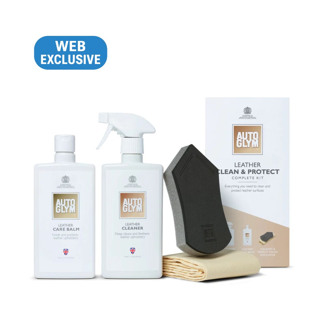 Autoglym leather care products including bottles, a spray, a sponge, and a cloth with packaging on a white background.