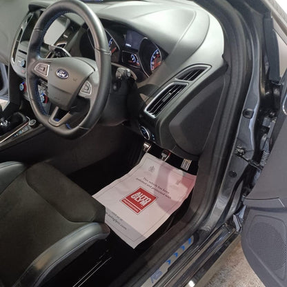 Autoglym Valet mat, paper mat in Car interior with a Ford document holder on the door panel