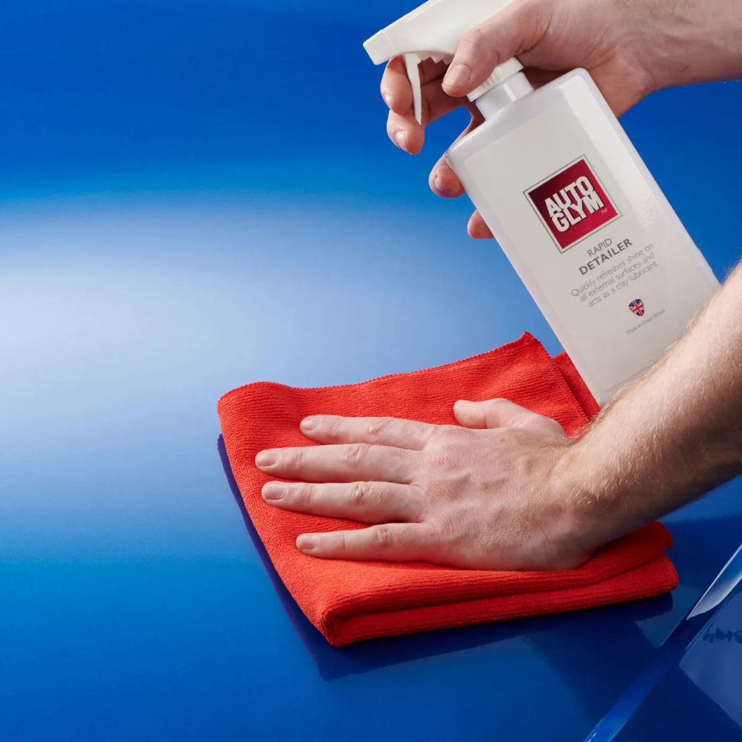 Autoglym Rapid Detailer Quick Detailer and Clay Lube 500ml with red microfibre cloth on blue car bonnet