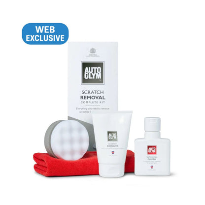 Autoglym scratch removal complete kit with a red towel, white applicator, and bottles on a white background.