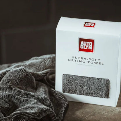 Autoglym ultra-soft drying towel packaging with a towel on a dark surface