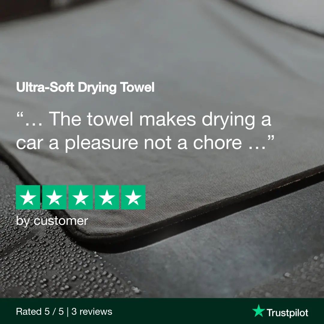 Car bonnet with an ultra-soft drying towel and customer review text.