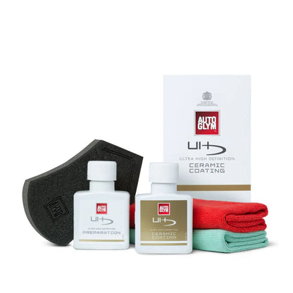 Autoglym ceramic coating products including bottles, cloths, and a applicator on a white background