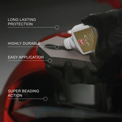 Hand applying a product to a surface with text highlighting features on a dark background
