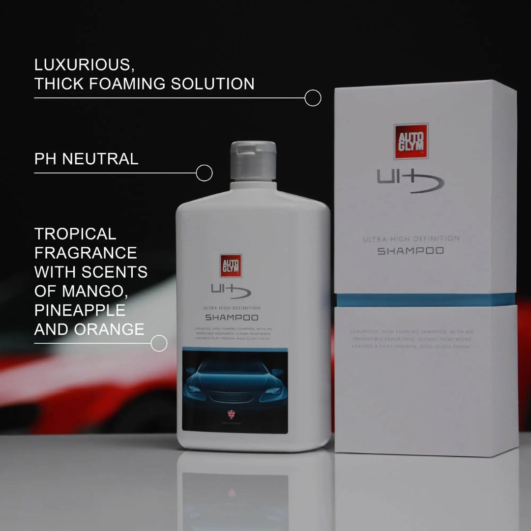 Car shampoo bottle and packaging with features highlighted on a dark background