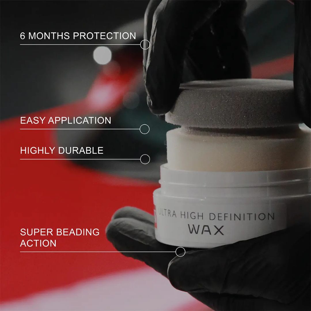 Ultra High Definition Wax container with glove, car in background, text highlighting features.