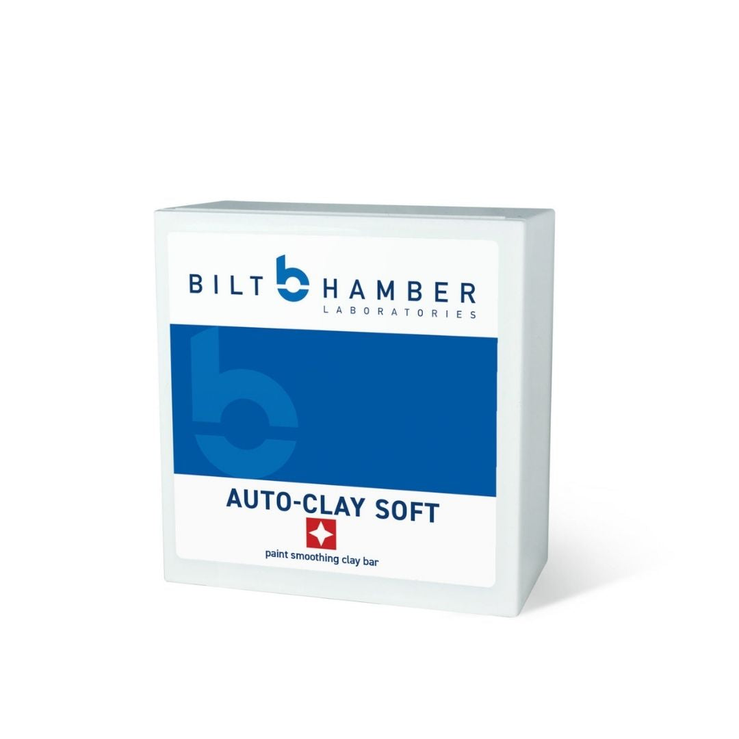 A white rectangular box of Bilt Hamber Laboratories Auto-Clay Soft clay bar, featuring a blue and white label with the product name and a small red Swiss cross logo, set against a plain white background.