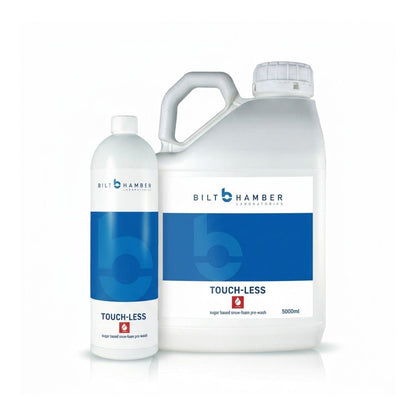 A 5000ml large white plastic jug and a 500ml smaller white plastic bottle of Bilt Hamber Professional Touch-Less 2 Super Fast Drying Clean Hair Pre-wash, shown on a white background.
