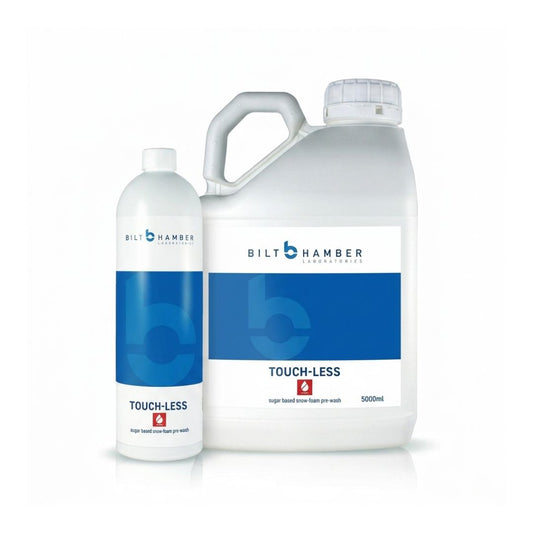 A 5000ml large white plastic jug and a 500ml smaller white plastic bottle of Bilt Hamber Professional Touch-Less 2 Super Fast Drying Clean Hair Pre-wash, shown on a white background.