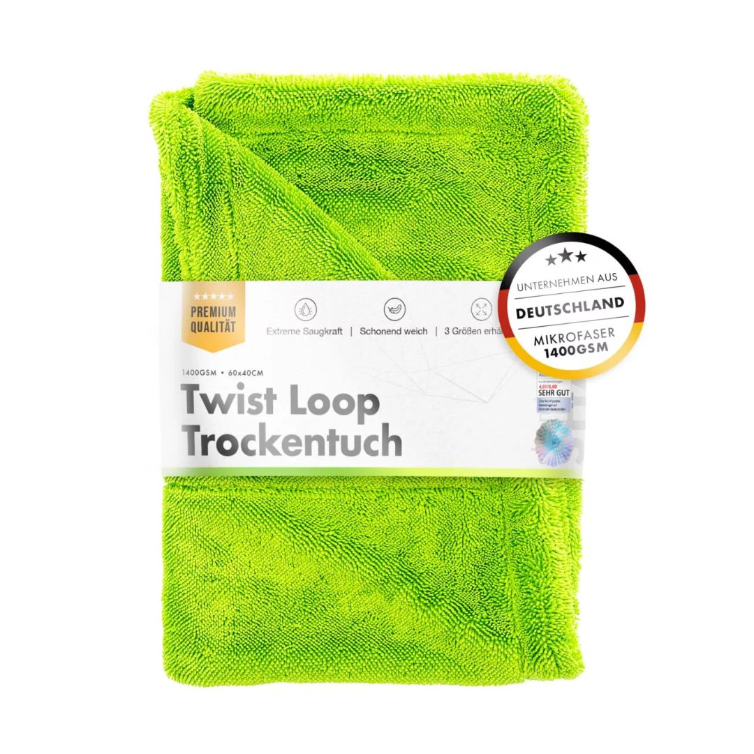 Green chemicalworks drying towel with packaging label on a white background