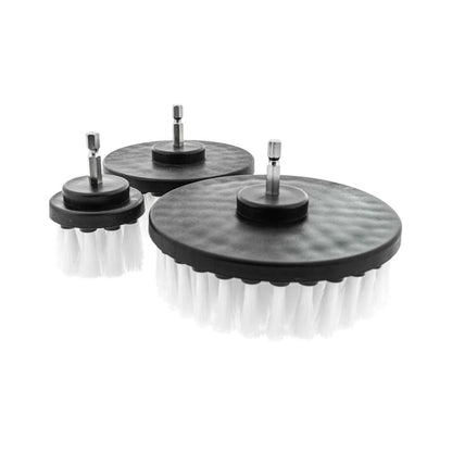 Set of three drill brush heads with varying bristle patterns on a white background