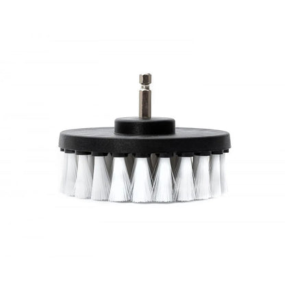 Cleaning drill brush with white bristles on a black base against a white background