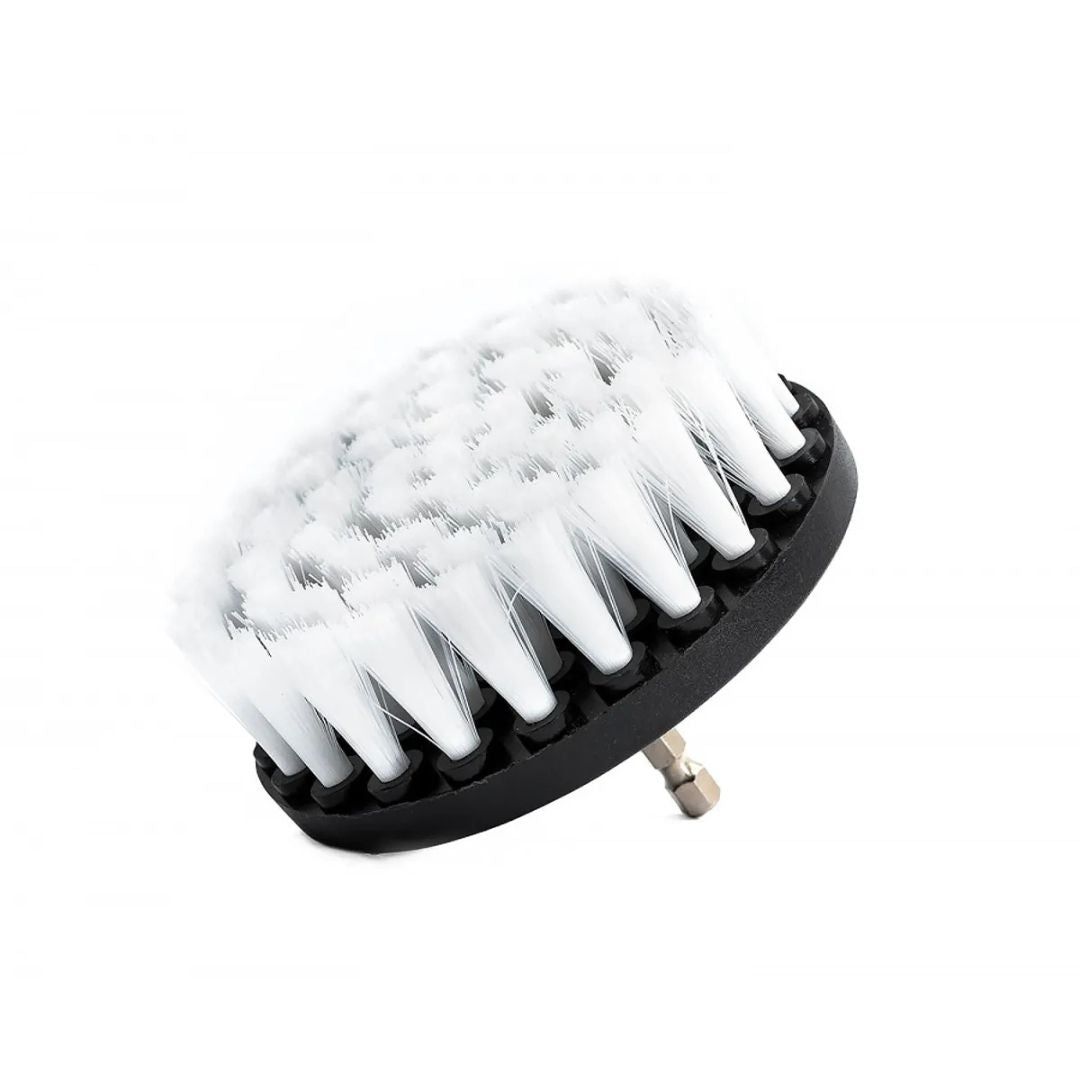 Black drill brush with white bristles on a white background