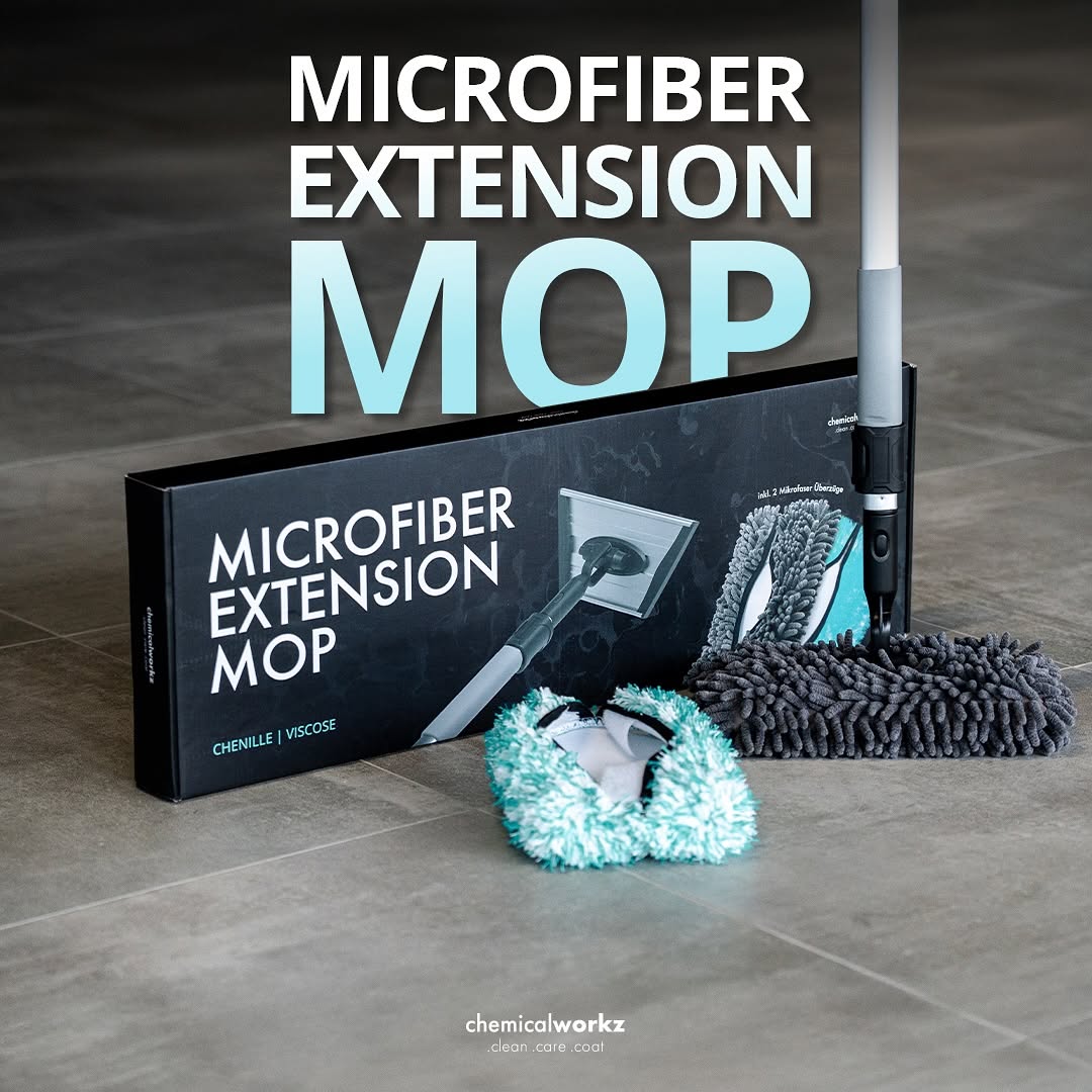 Microfiber extension mop with packaging on a tiled floor