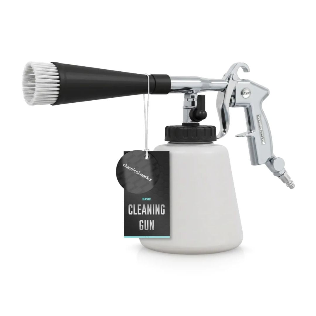 A Chemicalworkz Tornador air gun with a white plastic paint container, a black cap, and a polished silver and black metal spray mechanism, shown on a solid white background.