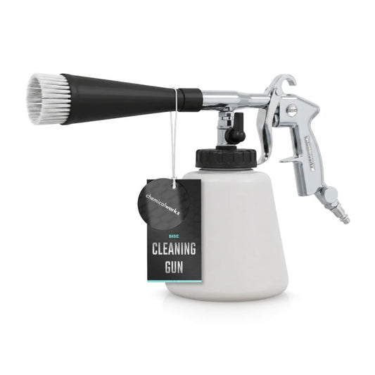 A Chemicalworkz Tornador air gun with a white plastic paint container, a black cap, and a polished silver and black metal spray mechanism, shown on a solid white background.