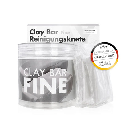 Chemicalworkz Magic Clay Bar  A clear plastic jar of Clay Bar Fine Reinigungsknete cleaning clay bars next to a sealed packet of individual clay bars, with the product packaging box behind it and a circular 'Deutschland Premium Qualität' badge on the right.
