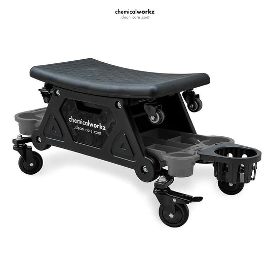 Black step stool with wheels and cup holders on a white background, featuring 'chemicalworkz' branding.