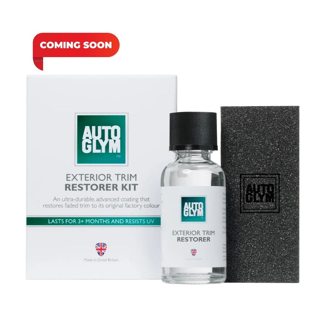 Autoglym exterior trim restorer kit with bottle, box, and applicator on a white background