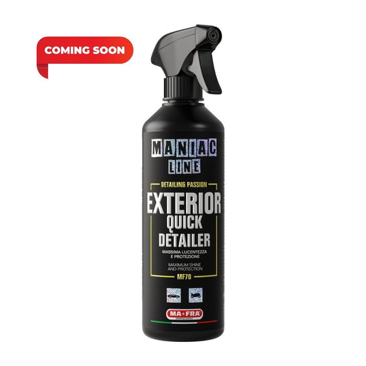 A black spray bottle of Maniac Line Exterior Quick Detailer on a white background, featuring a red 'COMING SOON' banner overlay in the top left corner.