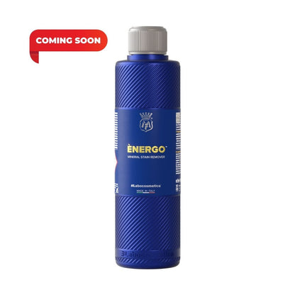 A blue cylindrical bottle of ÉNERGO Original Toxin Remover with a gray cap, shown on a white background with a red 'COMING SOON' badge in the top-left corner.