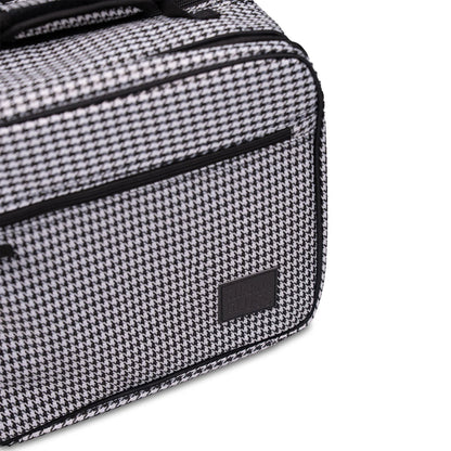 Black and white checkered bag with a visible brand logo on a white background