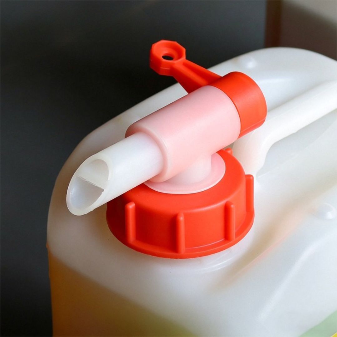 White container with a red pump and white tube on a dark background