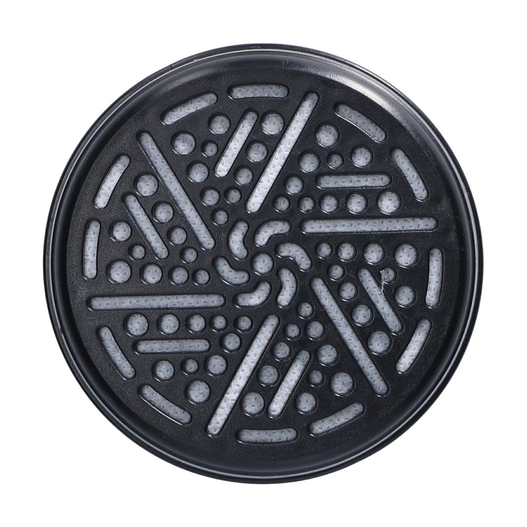 A round black textured filter or drain mat with a radial pattern of raised ridges and circular perforations, shown from a top-down view on a white background.
