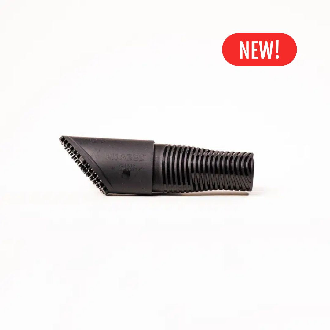Black Fur eel pet hair vacuum attachment with 'NEW!' label on a white background