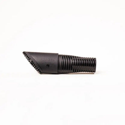Black Fur eel pet hair vacuum attachment on a white background