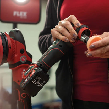 Person using a red and black Flex PXE 80 with a close-up of hands and tool.