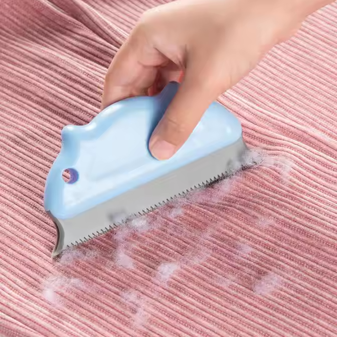 The APS Basics Fluff &amp; Hair Extractor is a practical tool designed to make cleaning pet hair, dirt, and lint from fabrics simple and effective. Ideal for use on upholstery, carpets, and mats, it helps lift and collect debris without damaging delicate fabrics.