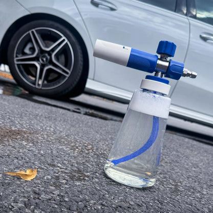 Car air freshener with blue and white design on a car's side mirror