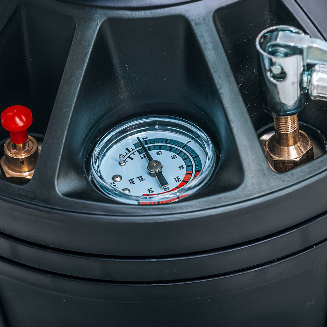 Close-up of an air compressor with a pressure gauge and valve. IK Window Tinting and PPF Sprayer Stainless Steel 13L