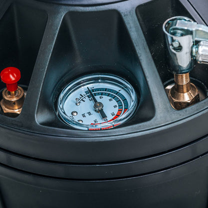 Close-up of an air compressor with a pressure gauge and valve. IK Window Tinting and PPF Sprayer Stainless Steel 13L