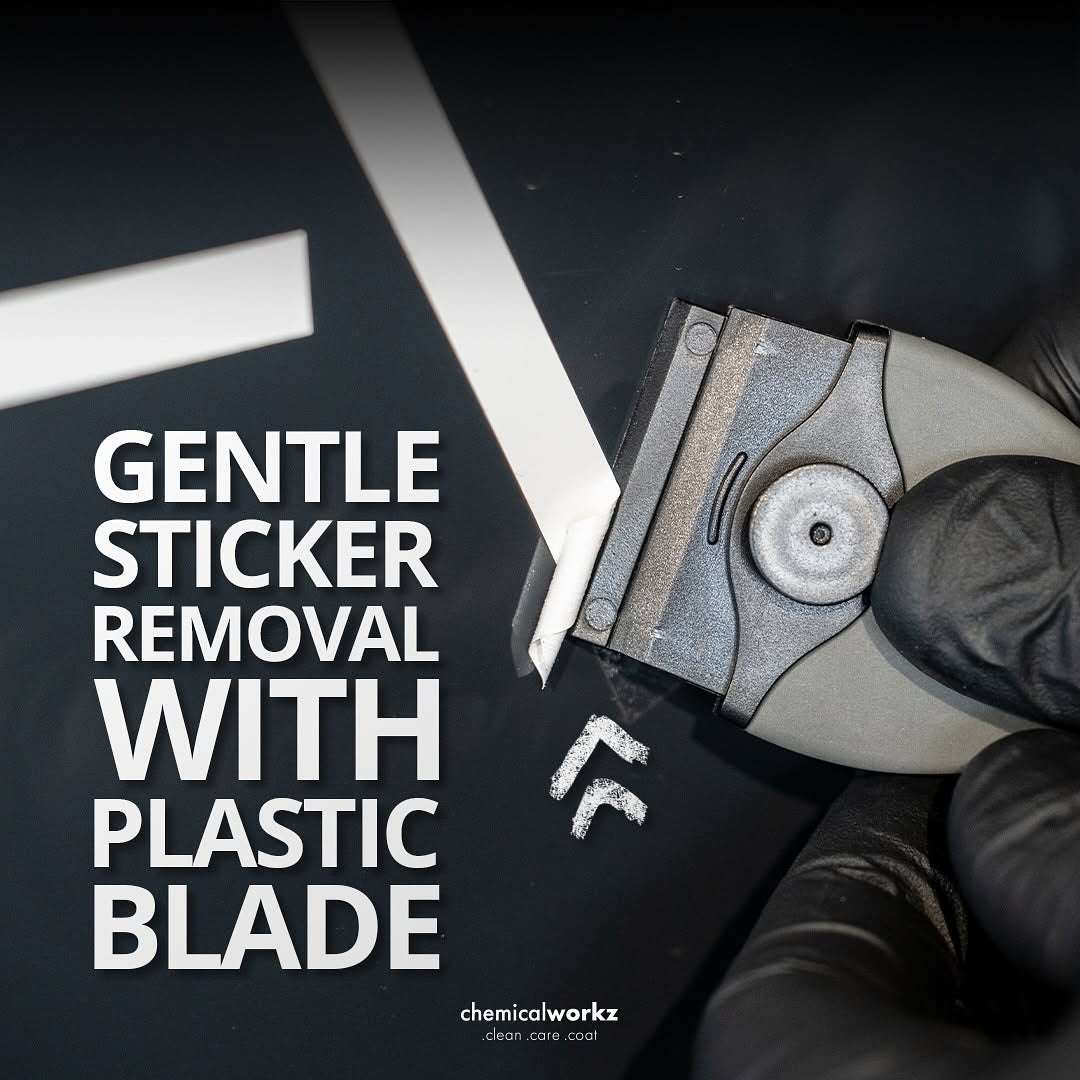 Person using a plastic blade for gentle sticker removal on a dark surface, with text overlay.