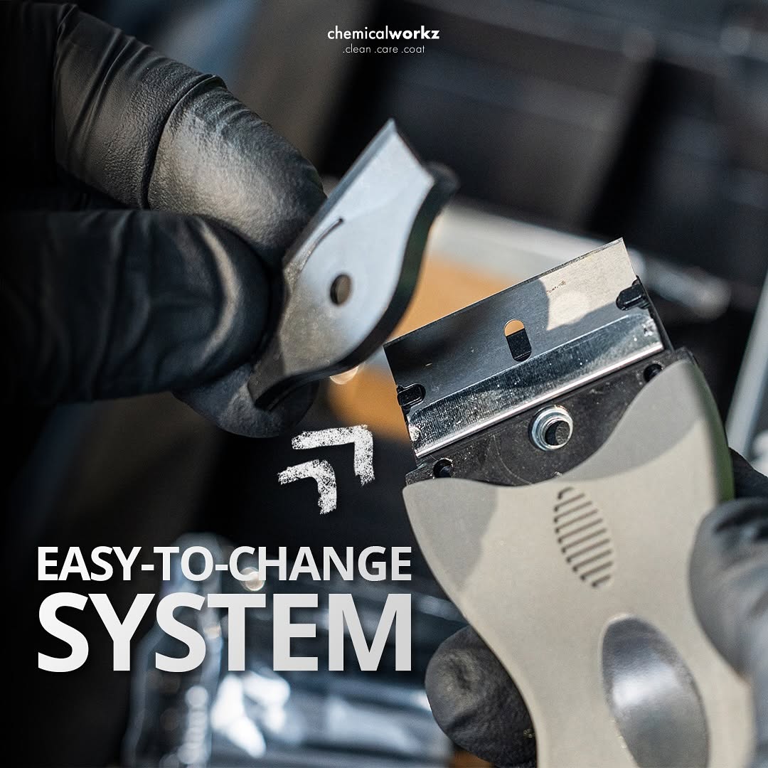 Plastic scraper system with razor and blade, labeled 'Easy-to-Change System' by chemicalworkz.