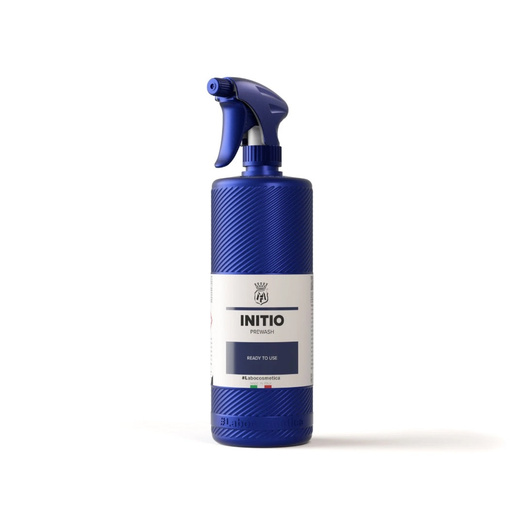 Blue spray bottle with 'INITIO' branding on a white background