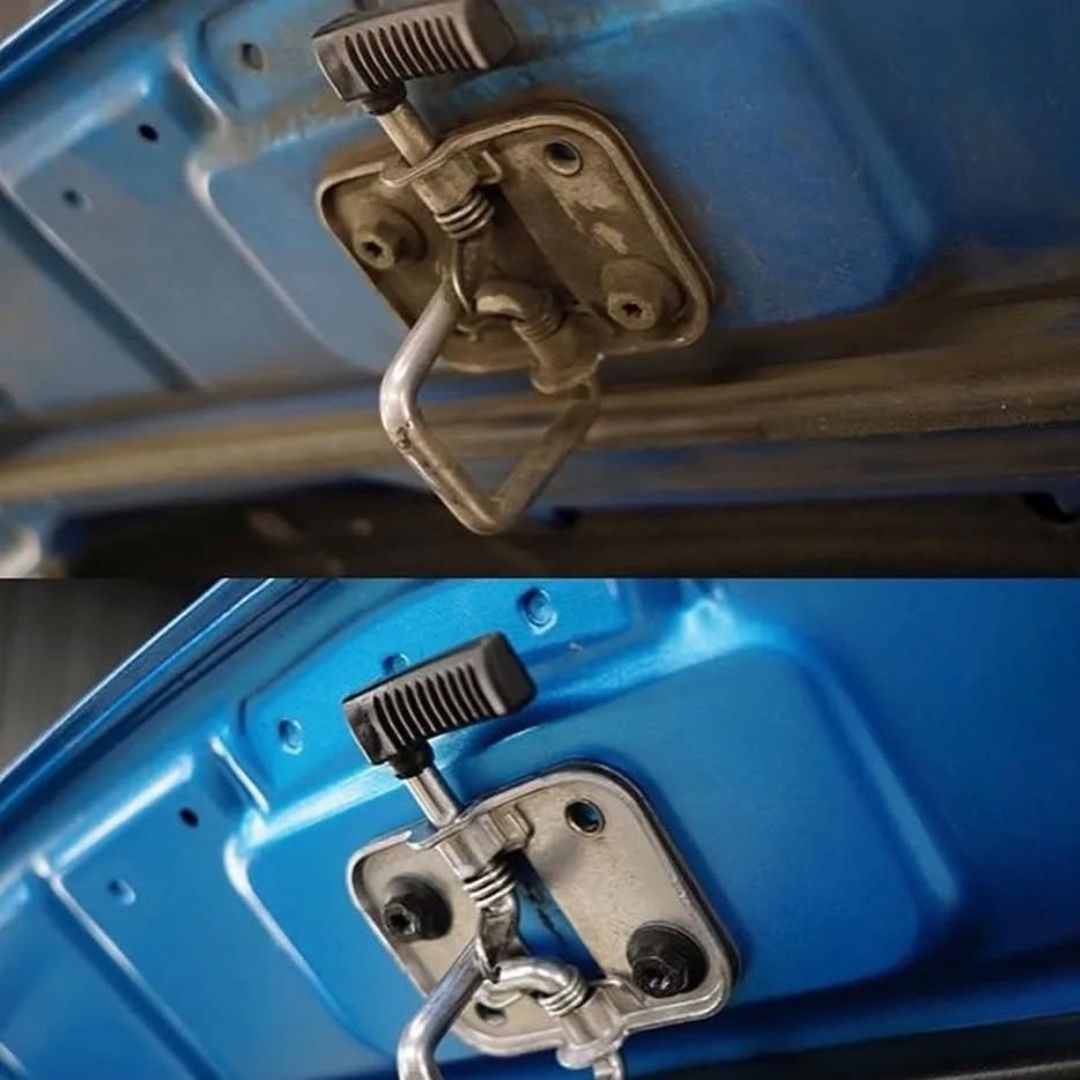 Close-up of a blue bonnet catch with metal clamps cleaned with Koch Chemie Green Star GS on a black background