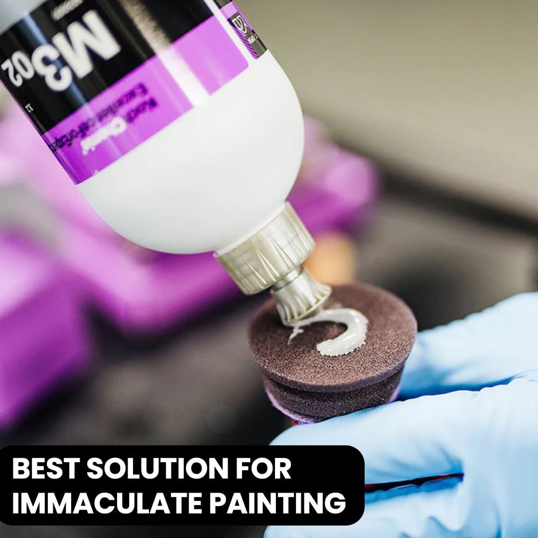 Koch Chemie Micro Cut M3.02. bein applied to a 2" wine red polishing pad