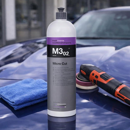 Koch Chemie Micro Cut M3.02. on blue mercedes with polishing machine on the side and blue soft microfibre cloth